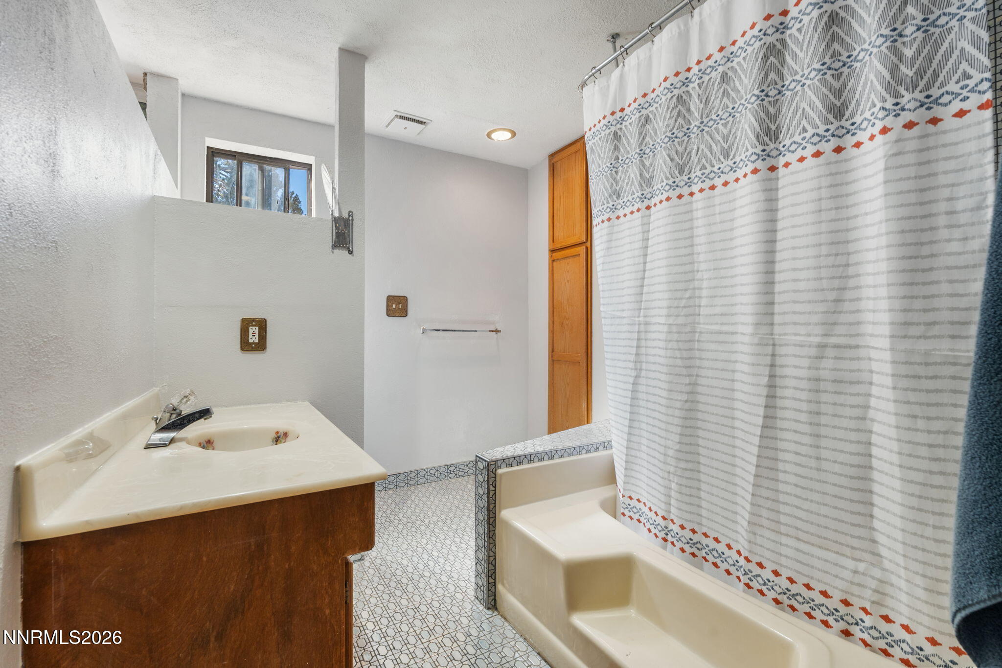 21845 Adobe Road Reno, NV 89521 - Photo 45 of 65 a bathroom with a sink and a mirror