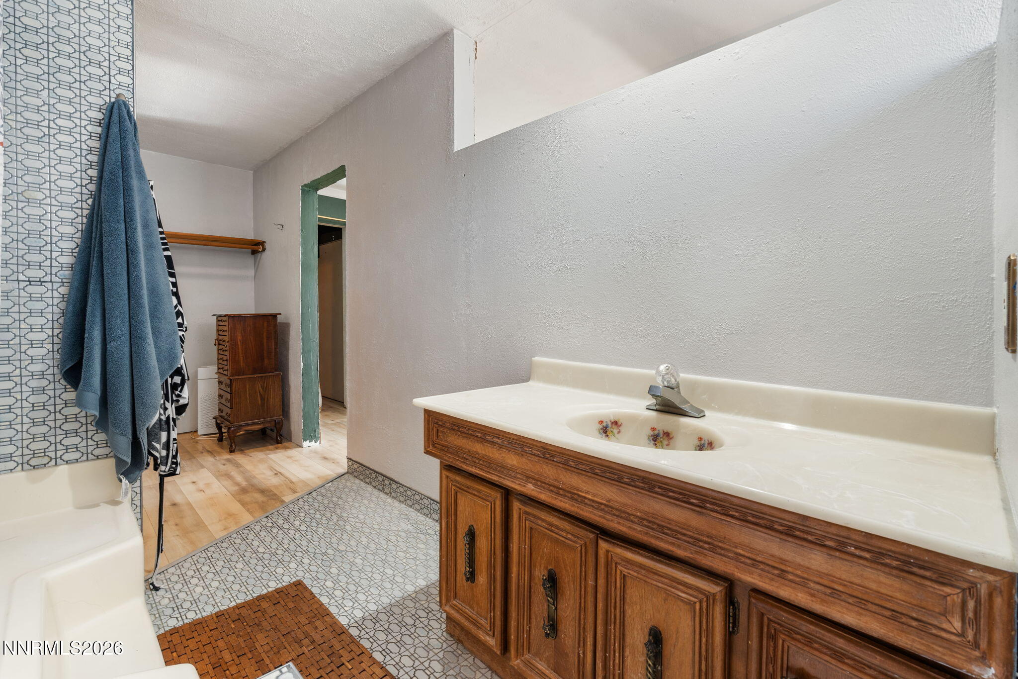 21845 Adobe Road Reno, NV 89521 - Photo 46 of 65 a bathroom with a sink and a mirror