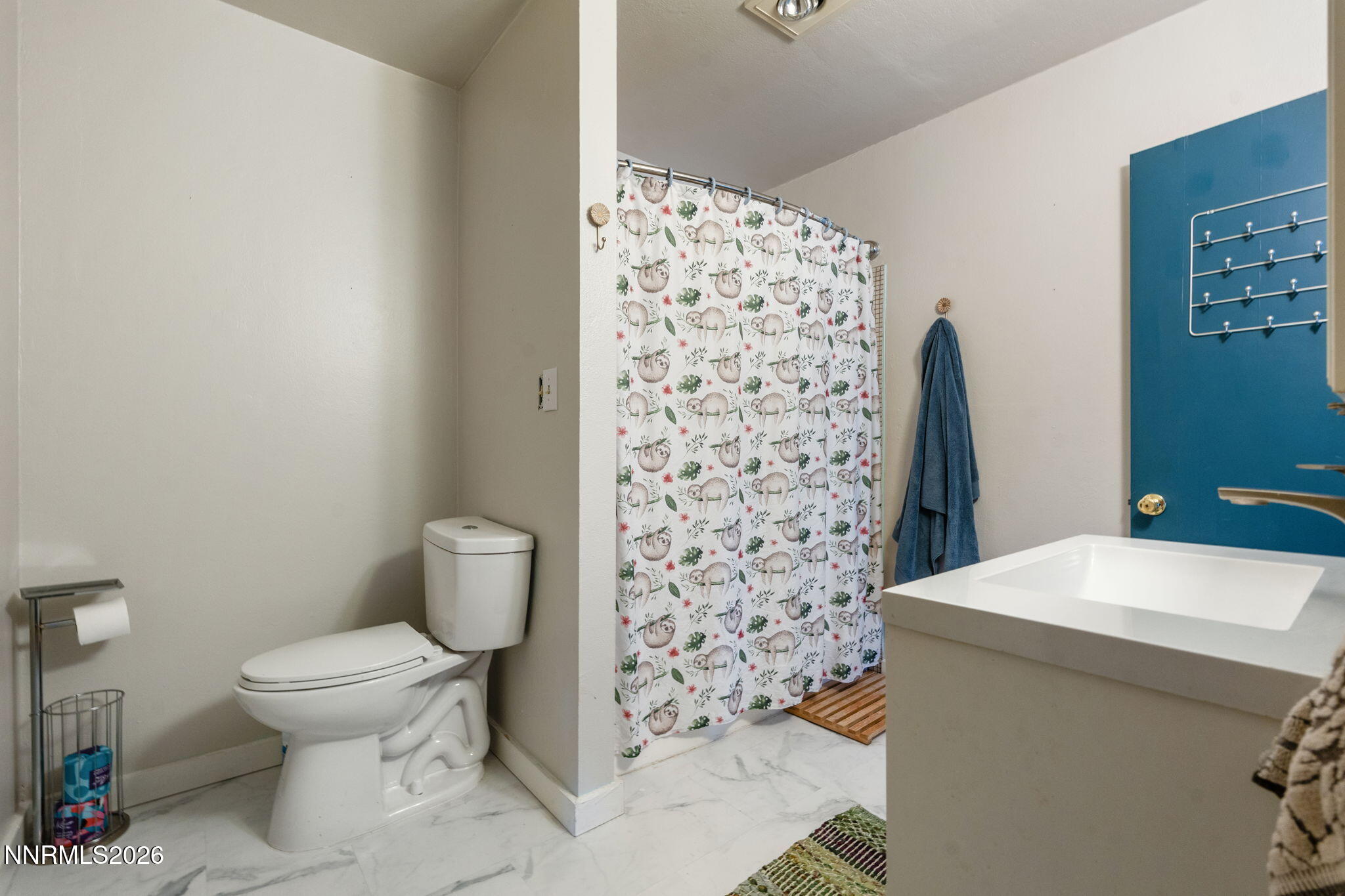21845 Adobe Road Reno, NV 89521 - Photo 48 of 65 a bathroom with a toilet and a shower
