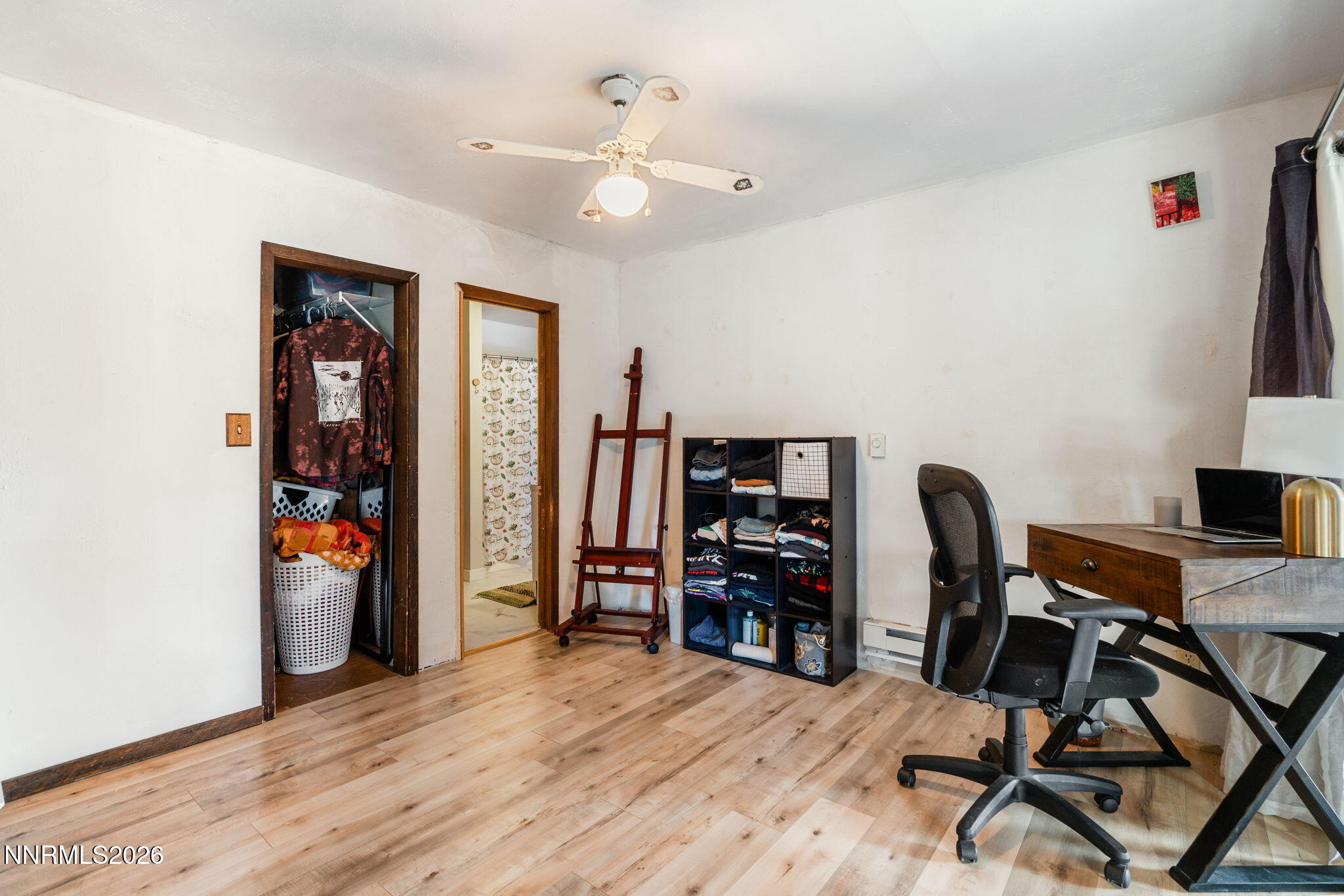 21845 Adobe Road Reno, NV 89521 - Photo 50 of 65 a view of a workspace with furniture and wooden floor