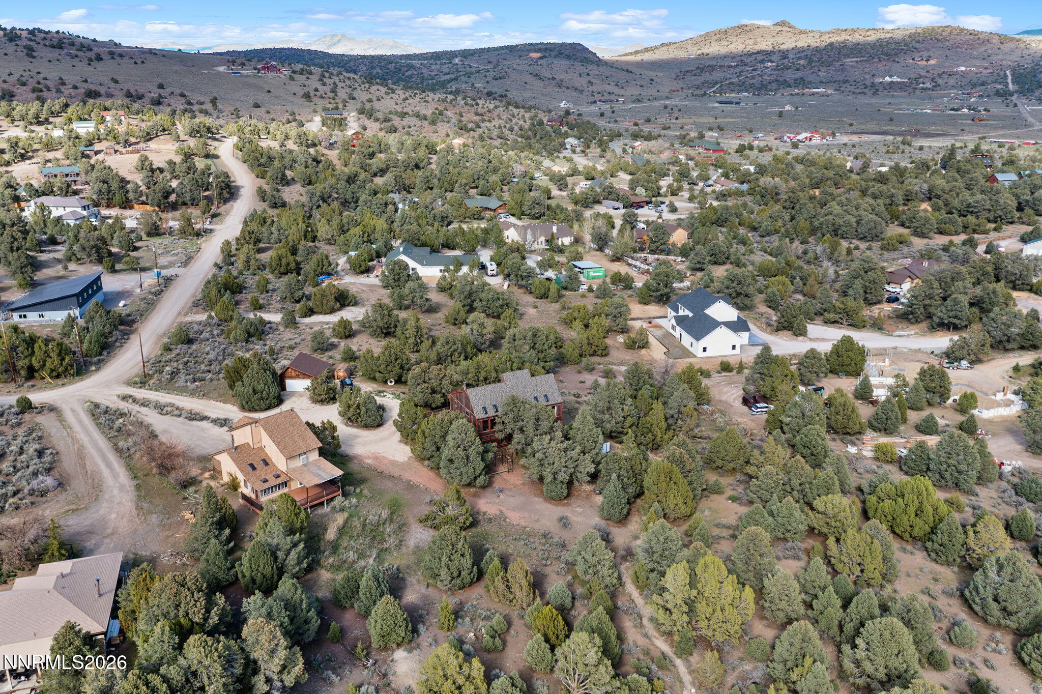 21845 Adobe Road Reno, NV 89521 - Photo 64 of 65 an aerial view of residential house and sandy dunes