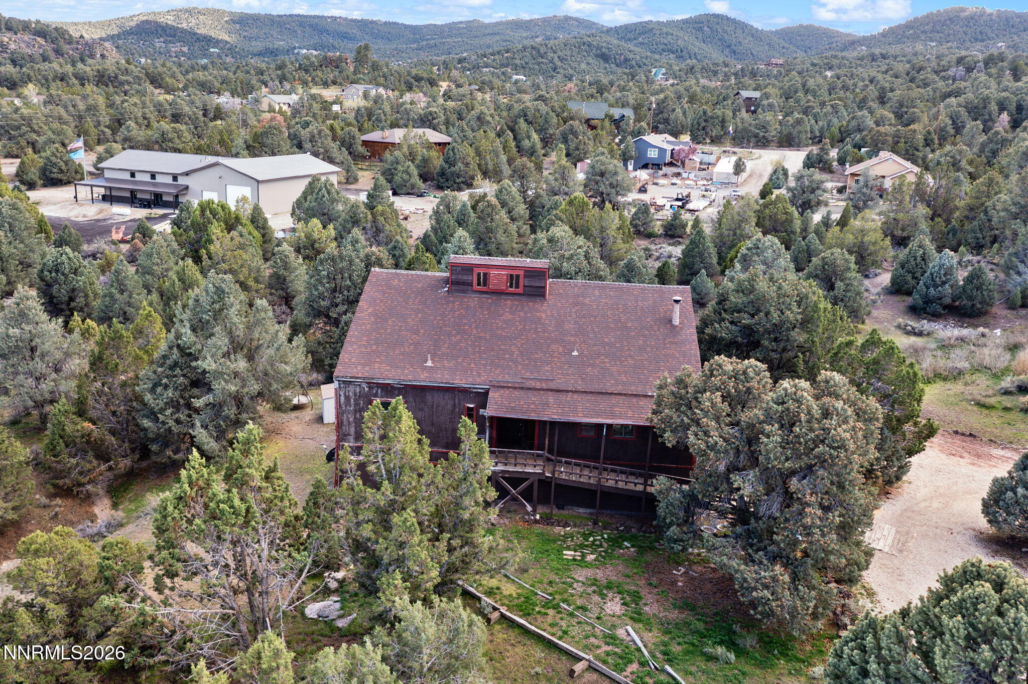 21845 Adobe Road Reno, NV 89521 - Photo 9 of 65 an aerial view of a house with a yard