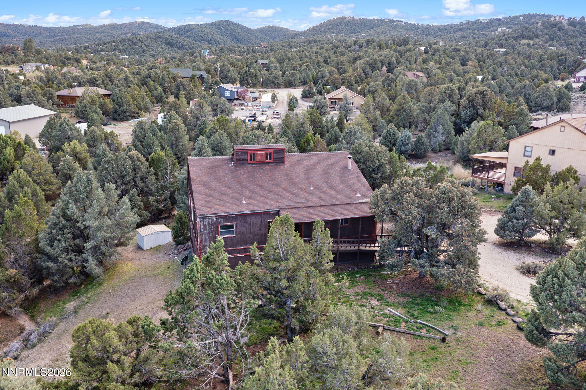 21845 Adobe Road Reno, NV 89521 - Photo 10 of 65 an aerial view of a house with a yard