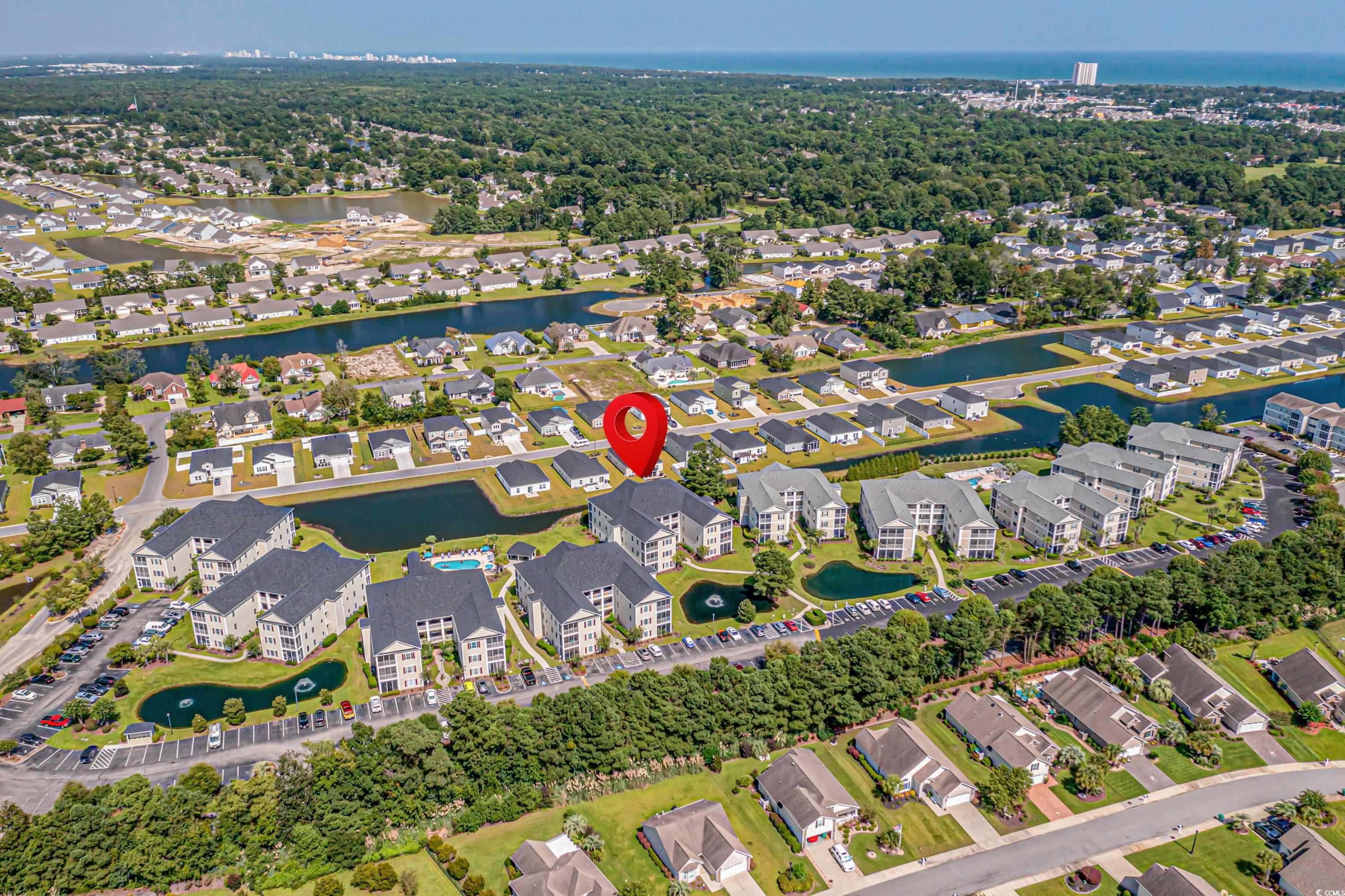 2050 Cross Gate Boulevard, Unit 303 Myrtle Beach, SC 29575 - Photo 2 of 35 Aerial view featuring a water view