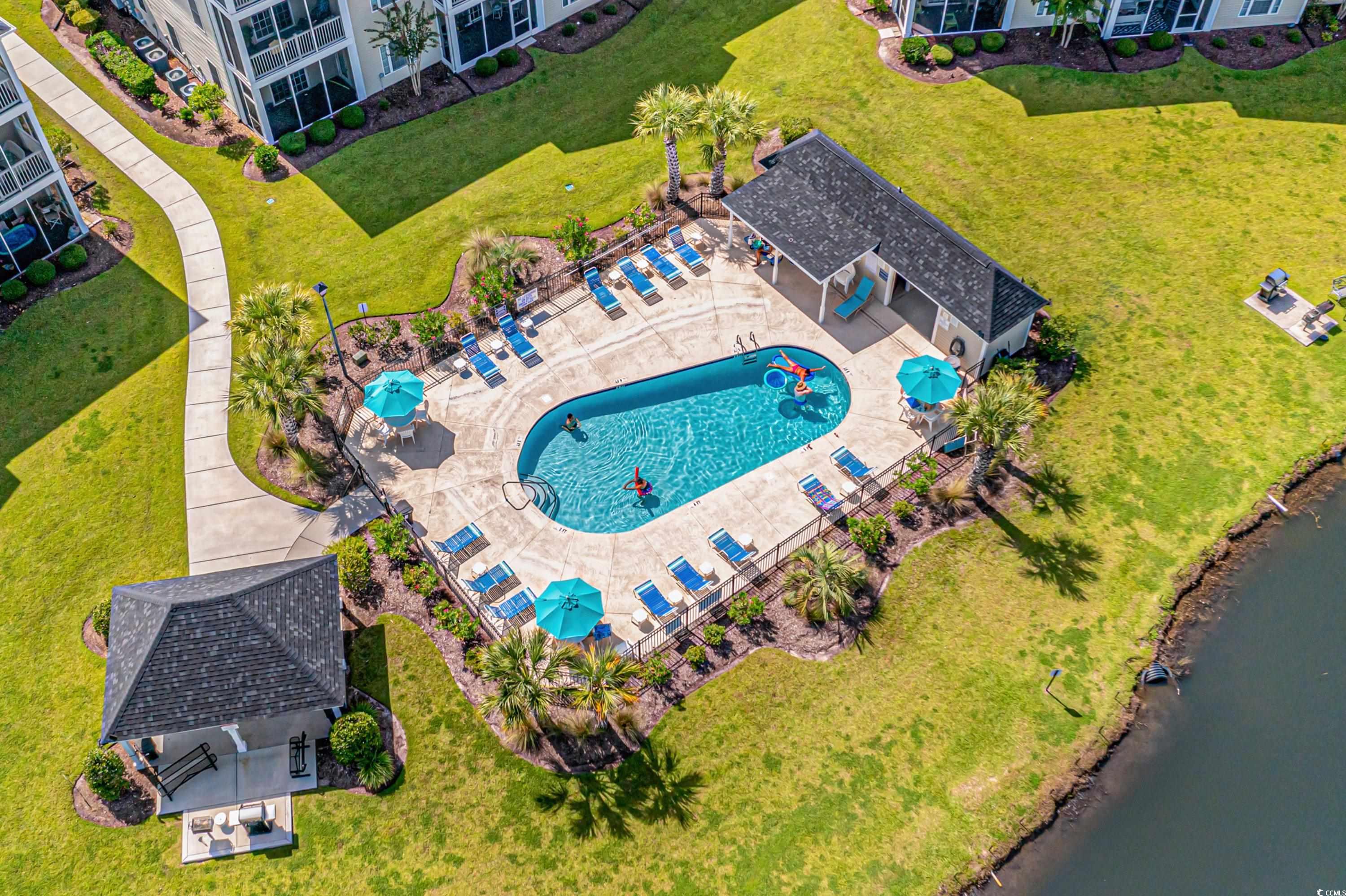 2050 Cross Gate Boulevard, Unit 303 Myrtle Beach, SC 29575 - Photo 32 of 35 Birds eye view of property with a water view