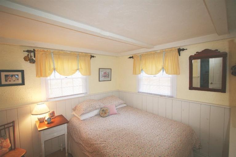 118 Richardson Road Centerville, MA 02632 - Photo 19 of 27 a bedroom with a bed and a window