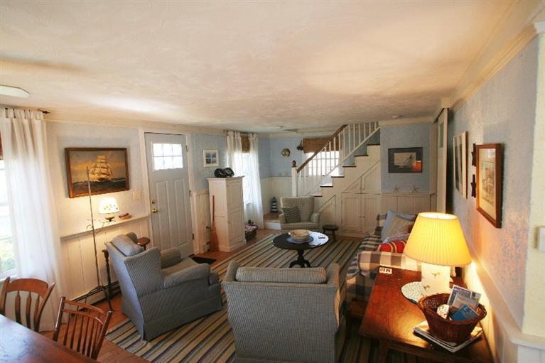 118 Richardson Road Centerville, MA 02632 - Photo 8 of 27 a living room with furniture and a flat screen tv