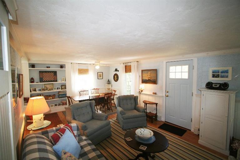 118 Richardson Road Centerville, MA 02632 - Photo 10 of 27 a living room with furniture and a flat screen tv