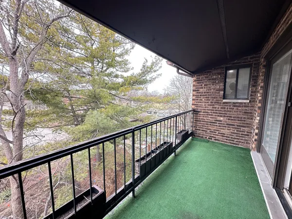 a view of a porch with a yard