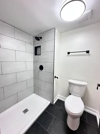 a bathroom with a toilet and a sink