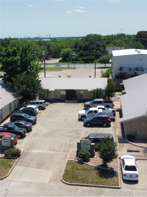 1601 South College Avenue Bryan, TX 77801 - Photo 2 of 11 View of uncovered parking lot