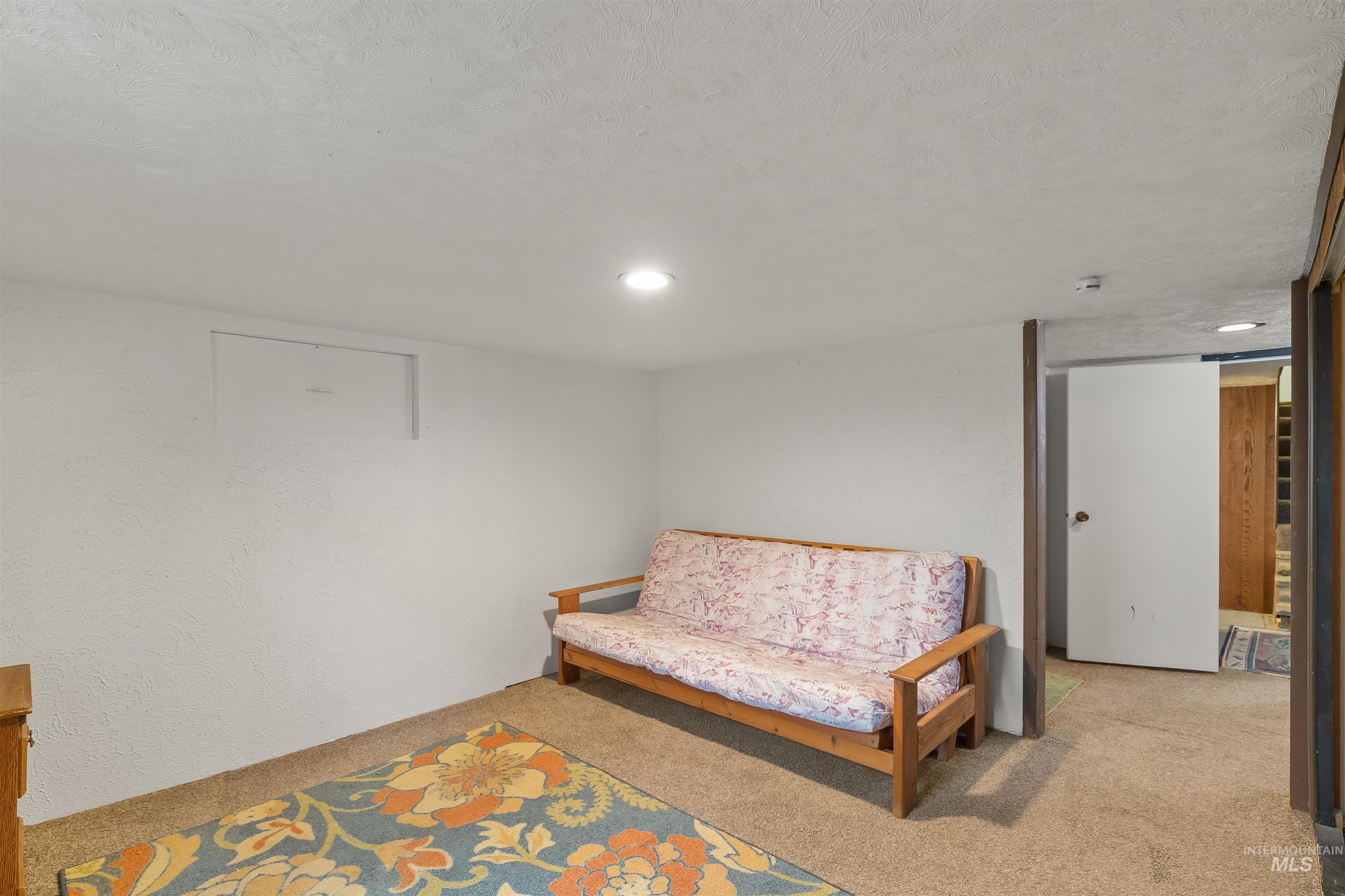 924 N Street Lewiston, ID 83501 - Photo 36 of 46 Carpeted interior space featuring white painted walls and a flush-mount ceiling light