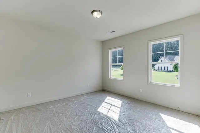 an empty room with windows