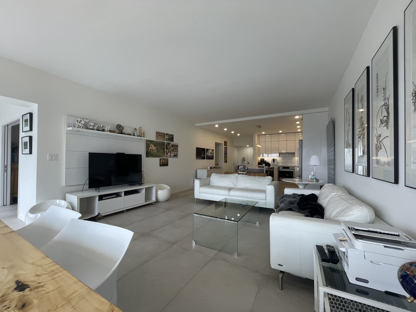 175 East Delaware Place, Unit 4723 Chicago, IL 60611 - Photo 12 of 26 a living room with furniture and a flat screen tv