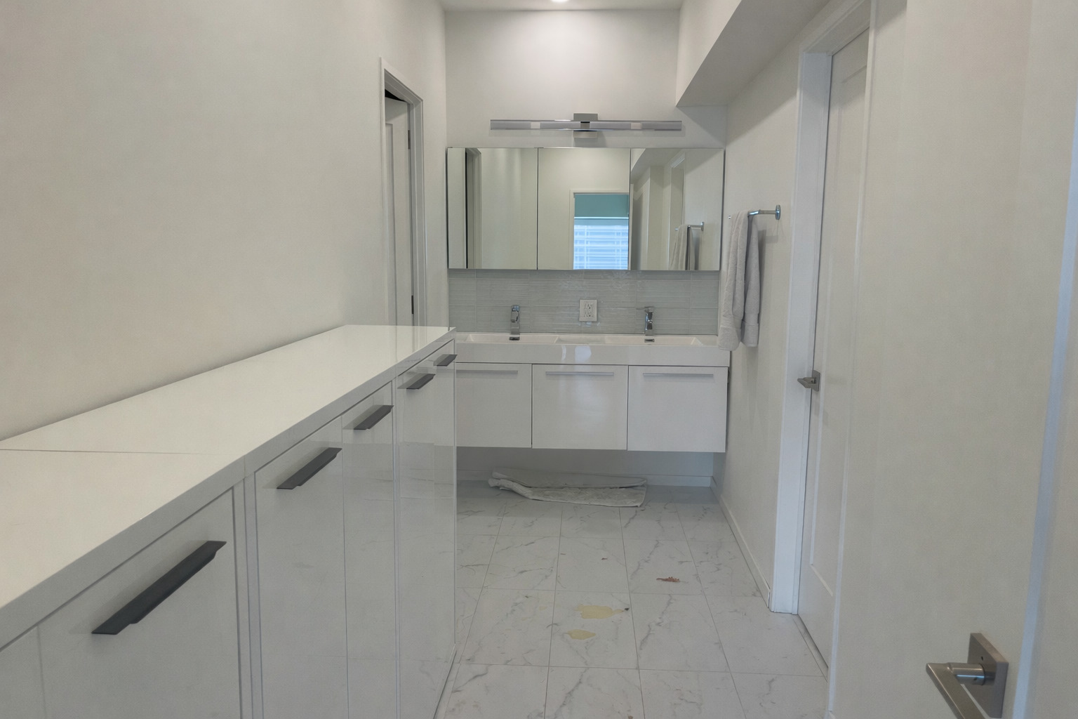 175 East Delaware Place, Unit 4723 Chicago, IL 60611 - Photo 23 of 26 a bathroom with a sink a toilet and mirror