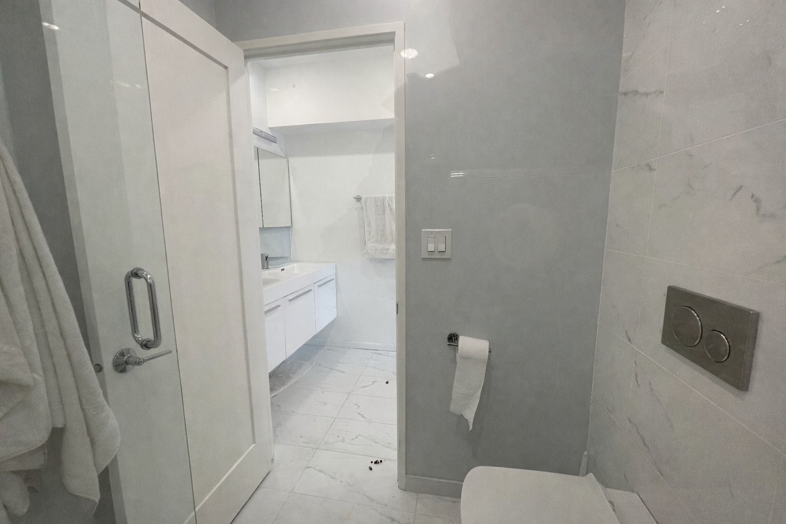 175 East Delaware Place, Unit 4723 Chicago, IL 60611 - Photo 25 of 26 a bathroom with a toilet and a shower