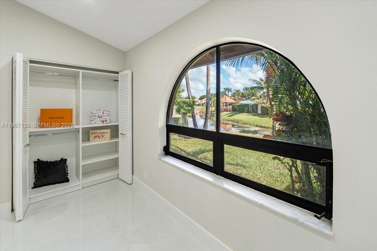 22708 Meridiana Drive Boca Raton, FL 33433 - Photo 18 of 49 a view of a large window with an outdoor space
