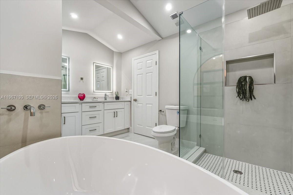 22708 Meridiana Drive Boca Raton, FL 33433 - Photo 26 of 49 a spacious bathroom with a sink a toilet and shower
