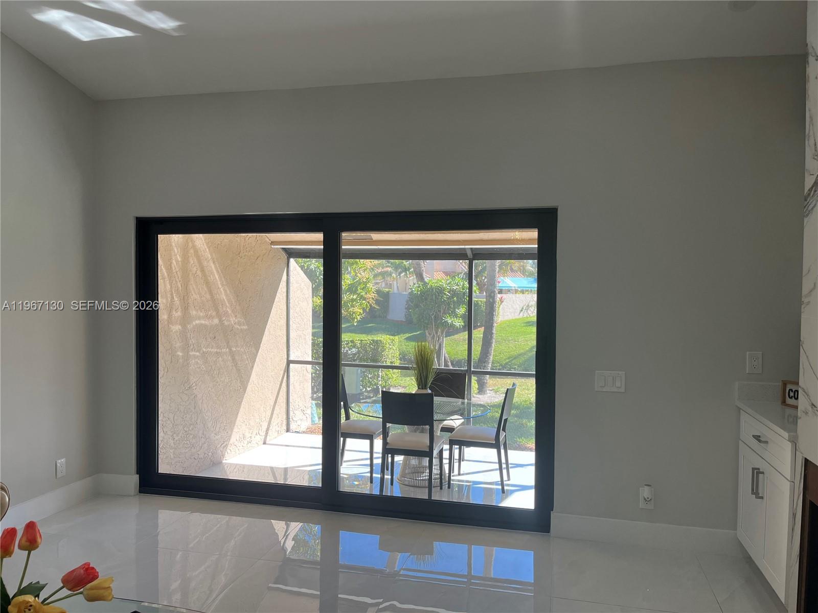 22708 Meridiana Drive Boca Raton, FL 33433 - Photo 30 of 49 a view of an entryway with wooden floor