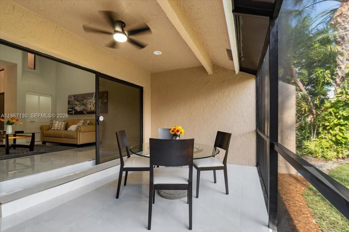 22708 Meridiana Drive Boca Raton, FL 33433 - Photo 38 of 49 a dining room with furniture and window