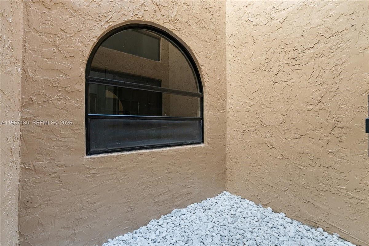 22708 Meridiana Drive Boca Raton, FL 33433 - Photo 40 of 49 a bathroom with a sink and a shower