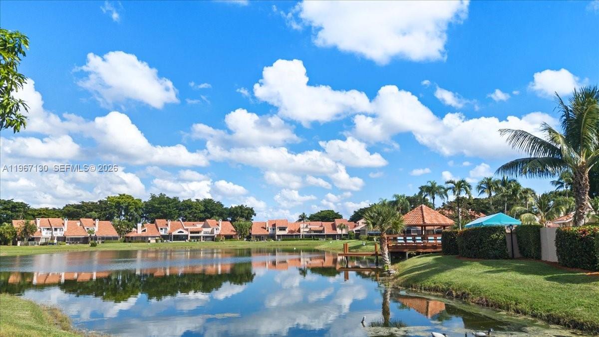 22708 Meridiana Drive Boca Raton, FL 33433 - Photo 48 of 49 a view of a lake with houses