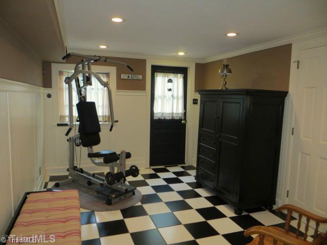 1760 Robinhood Road Winston-Salem, NC 27104 - Photo 11 of 16 Studio/Study/Office. Office is currently being used as exercise area. Walkout basement. This room could be used as a playroom.