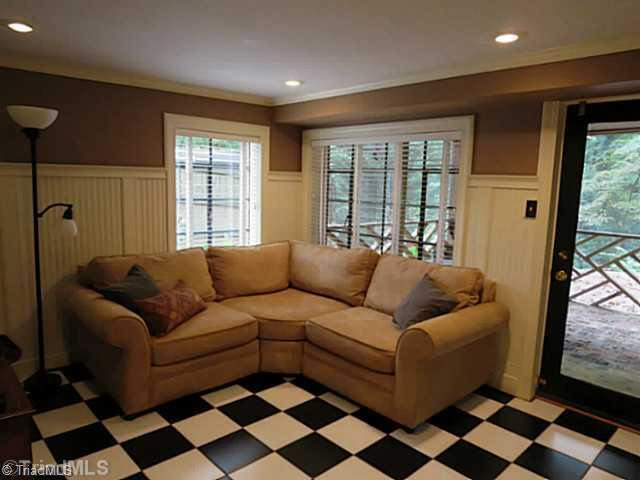 1760 Robinhood Road Winston-Salem, NC 27104 - Photo 12 of 16 4th Bedroom. 4th Bedroom is currently being used as another sitting area. It has a full bath and walks out to screen porch.