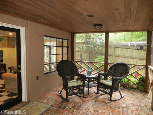 1760 Robinhood Road Winston-Salem, NC 27104 - Photo 13 of 16 Screened Porch. Large screened porch. Admire the beautiful brick work. Screened porch leads to another patio area.