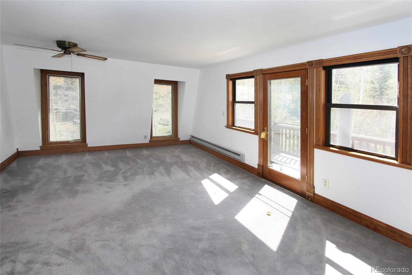 6250 Waterfall Loop Manitou Springs, CO 80829 - Photo 21 of 36 a view of an empty room with a window