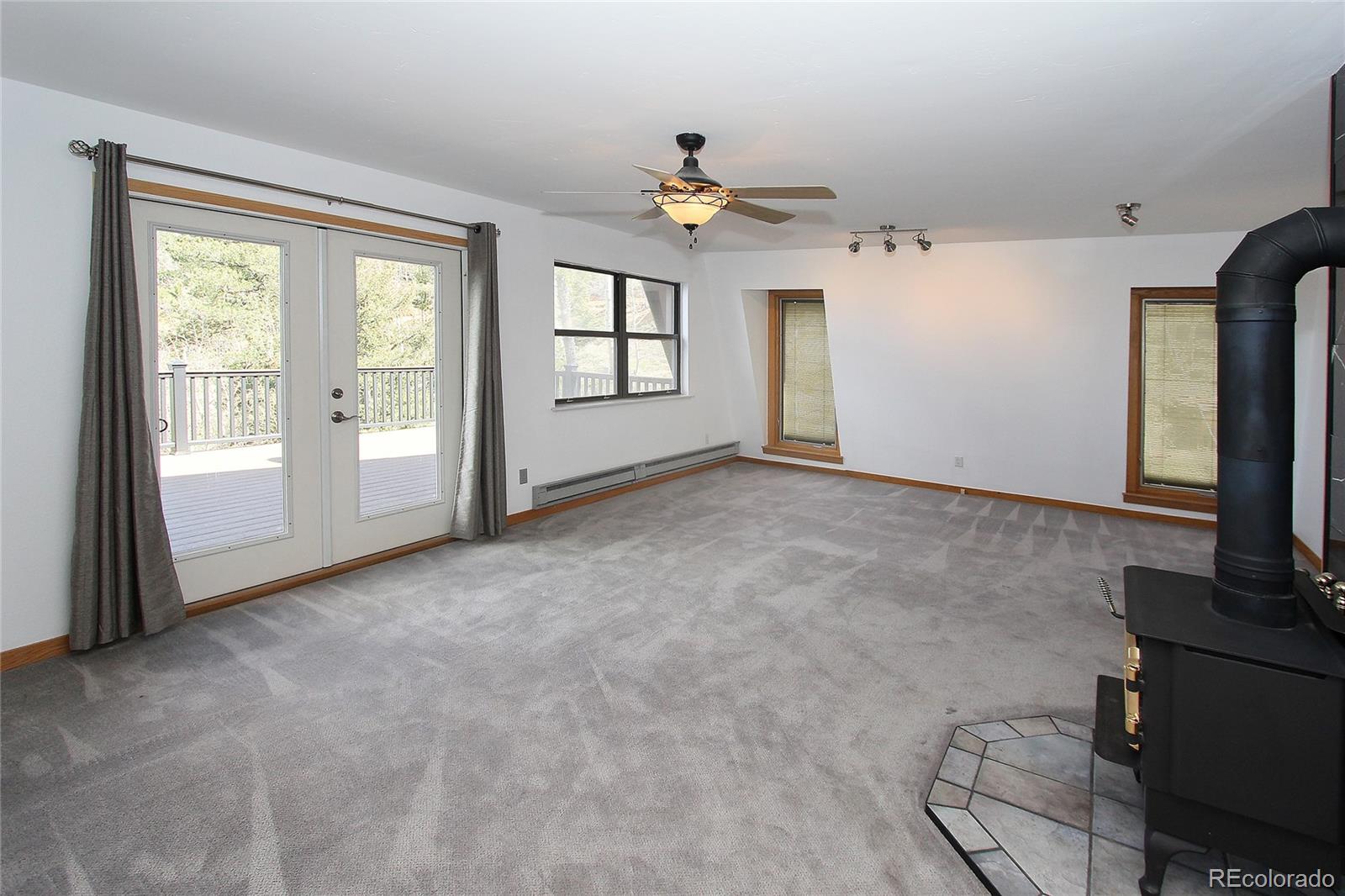 6250 Waterfall Loop Manitou Springs, CO 80829 - Photo 22 of 36 a view of an empty room with a window