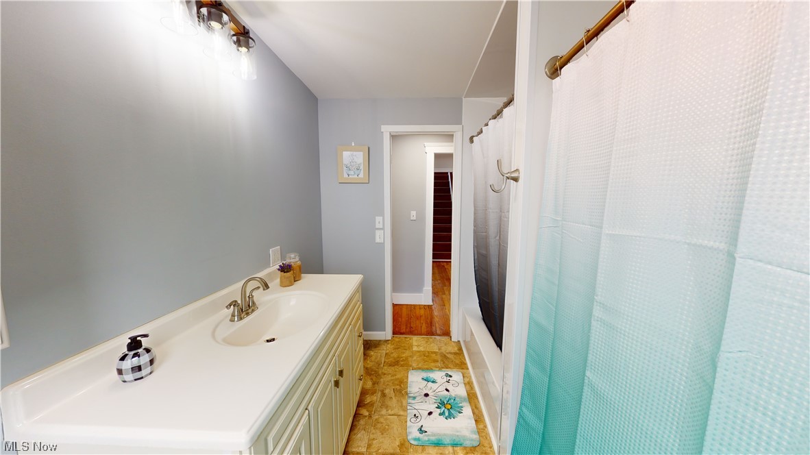 1331 Churchill Road Lyndhurst, OH 44124 - Photo 10 of 35 Bathroom featuring tile floors and vanity