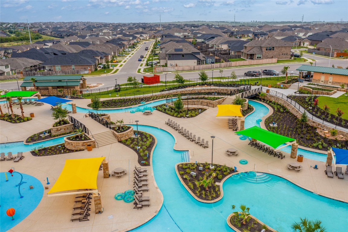 220 Begonia Street Buda, TX 78610 - Photo 20 of 24 an aerial view of residential houses with outdoor space