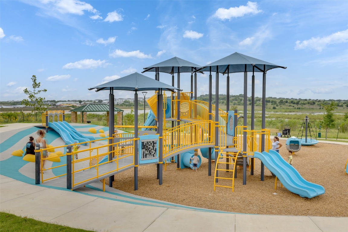 220 Begonia Street Buda, TX 78610 - Photo 24 of 24 a view of swimming pool with seating area