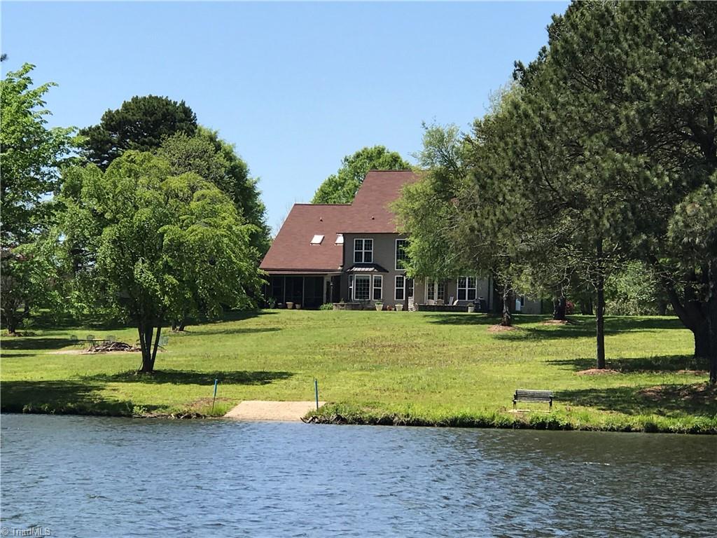 310 Cornatzer Road Mocksville, NC 27028 - Photo 5 of 46 Your own boat ramp is convenient and private! The rolling backyard provides a giant fire pit, mature fruit trees, flowers and launching beach area for your paddle board or kayak.