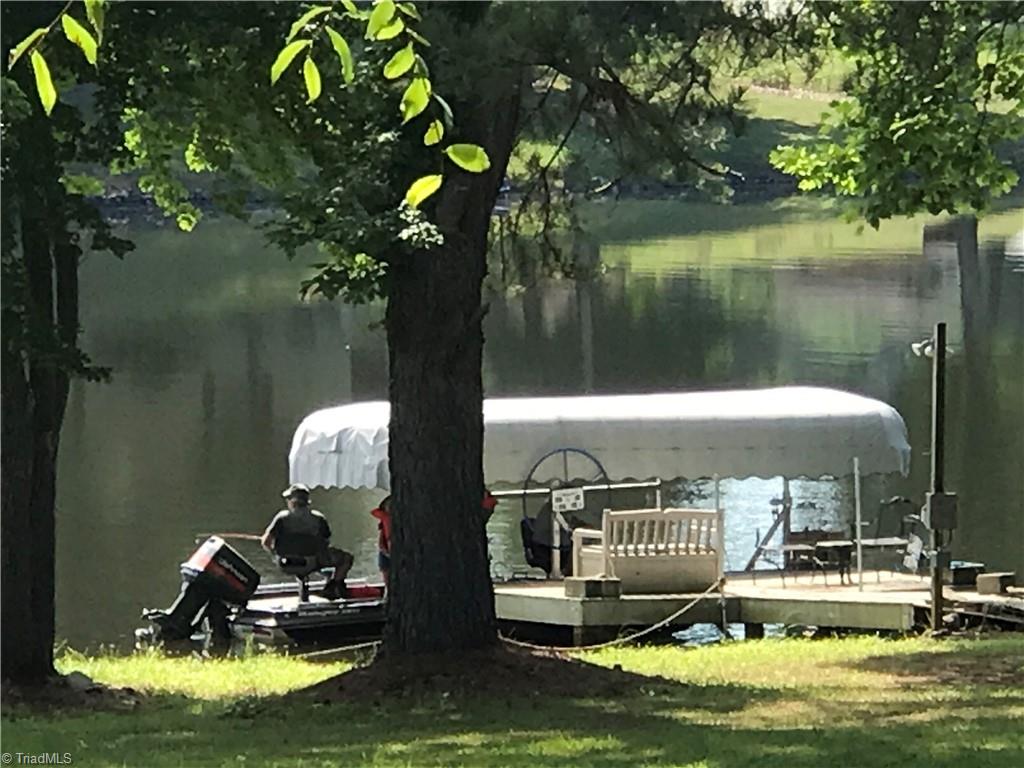 310 Cornatzer Road Mocksville, NC 27028 - Photo 6 of 46 Canopy covered boat lift protects your boat while giving you quick access to the lake you're sure to love.
