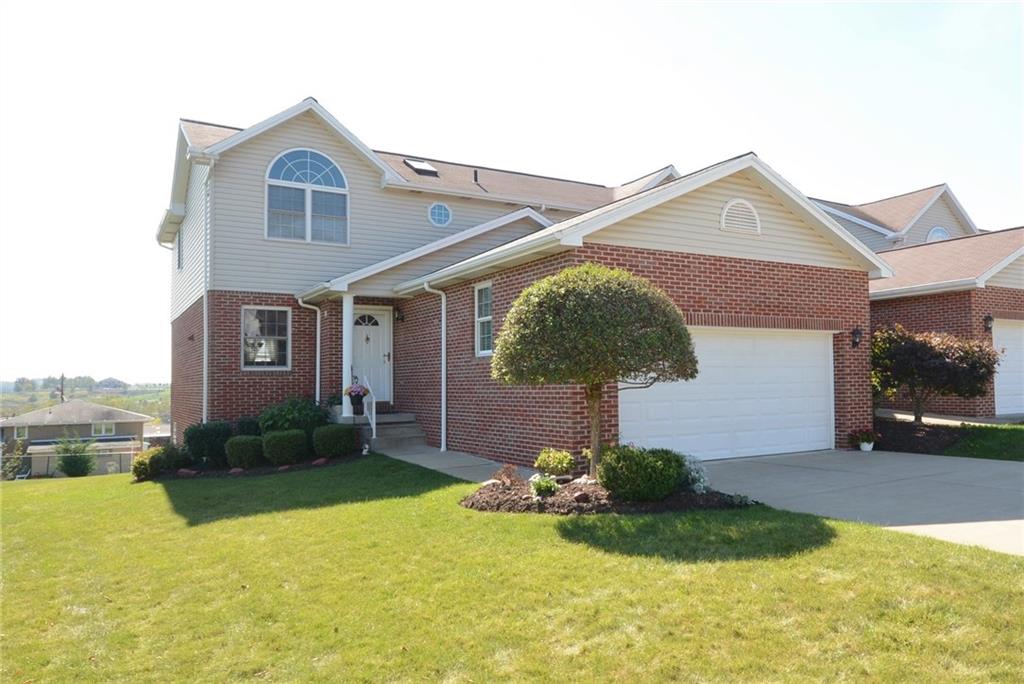 Welcome to this warm and inviting end unit townhouse! 