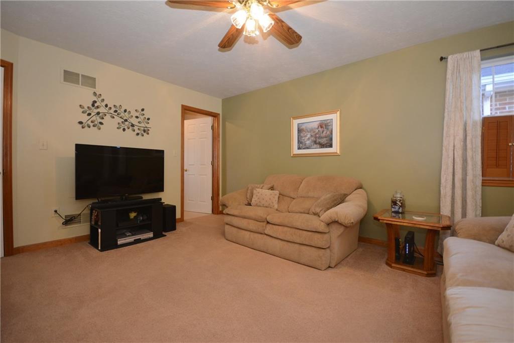 106 East Country Barn Road Houston, PA 15342 - Photo 14 of 25 The neutral carpets and pretty two tone walls make this room very inviting.