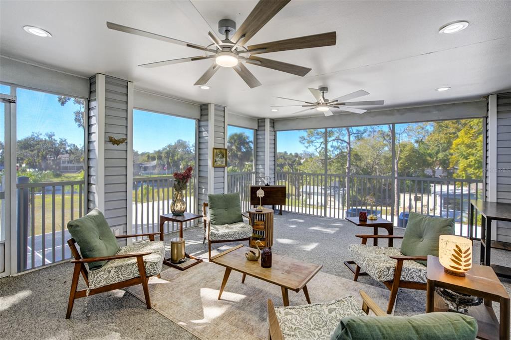6128 Oak Ridge Avenue New Port Richey, FL 34653 - Photo 20 of 55 a living room with furniture and a large window