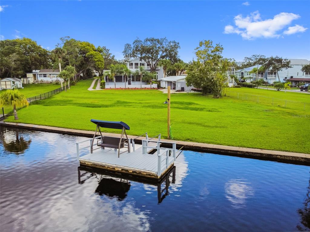6128 Oak Ridge Avenue New Port Richey, FL 34653 - Photo 6 of 55 a view of a park with lounge chairs