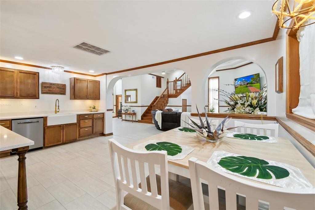 6128 Oak Ridge Avenue New Port Richey, FL 34653 - Photo 10 of 55 a living room with furniture fireplace and flat screen tv