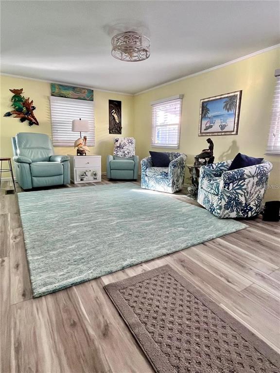 2295 North Beach Road, Unit 23 Englewood, FL 34223 - Photo 8 of 19 a living room with furniture windows and a couch