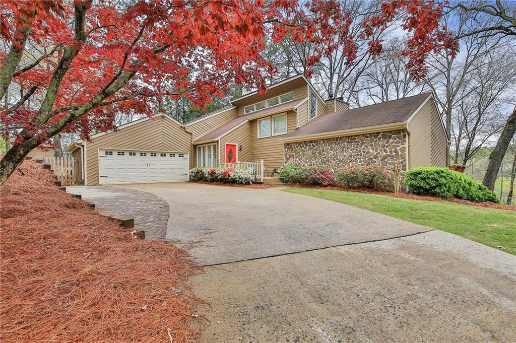 325 Tigris Way Alpharetta, GA 30022 - Photo 1 of 1 Great curb appeal with beautifully landscaped front yard.