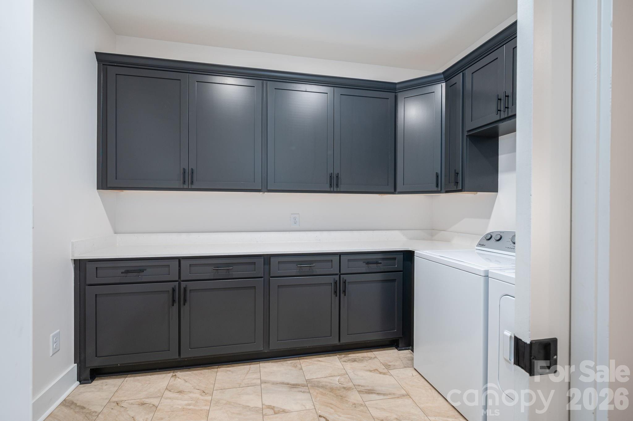 6335 Forney Hill Road Denver, NC 28037 - Photo 15 of 46 a kitchen with a sink and cabinets