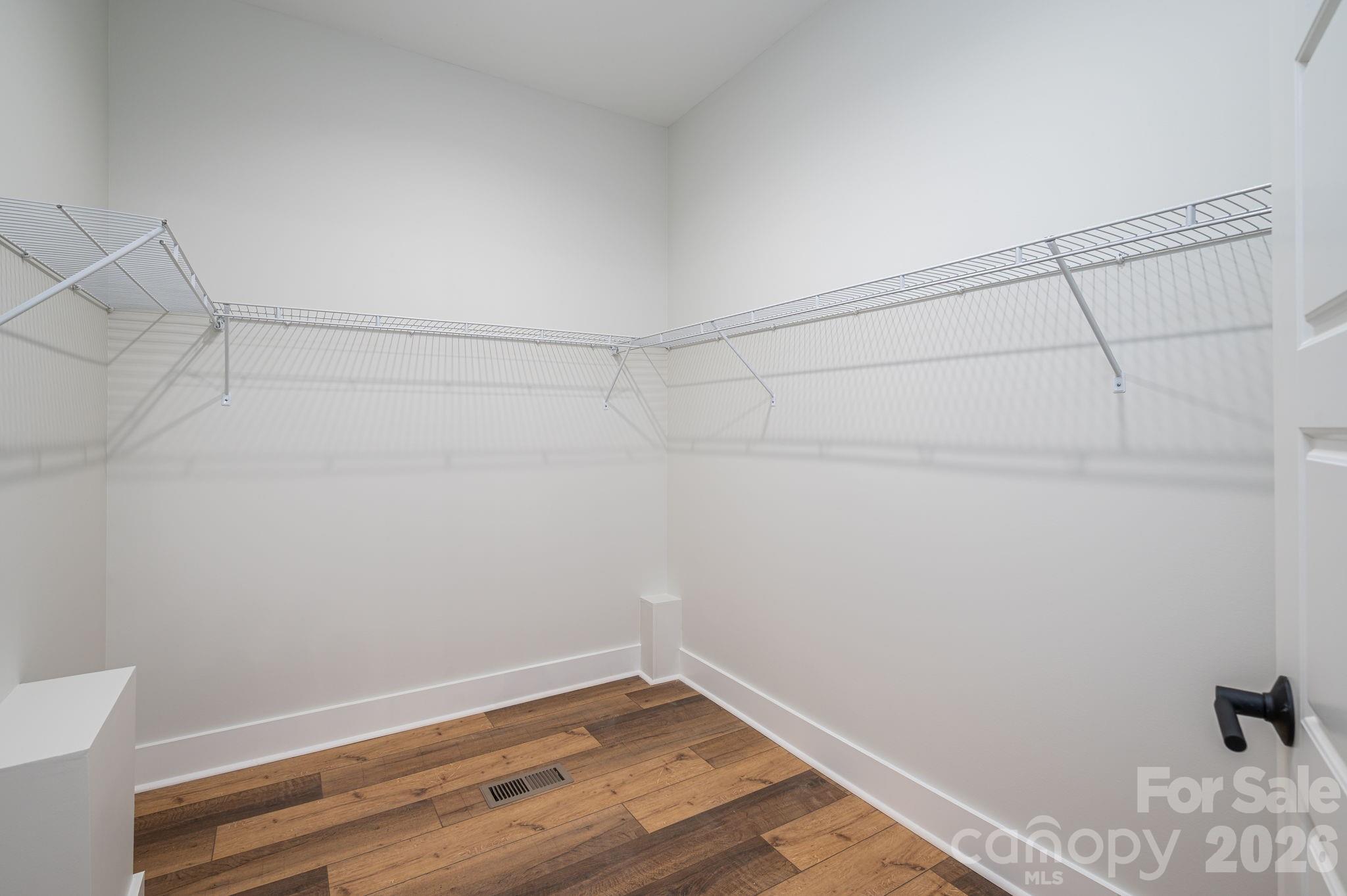 6335 Forney Hill Road Denver, NC 28037 - Photo 22 of 46 a view of a room with racks on the wall