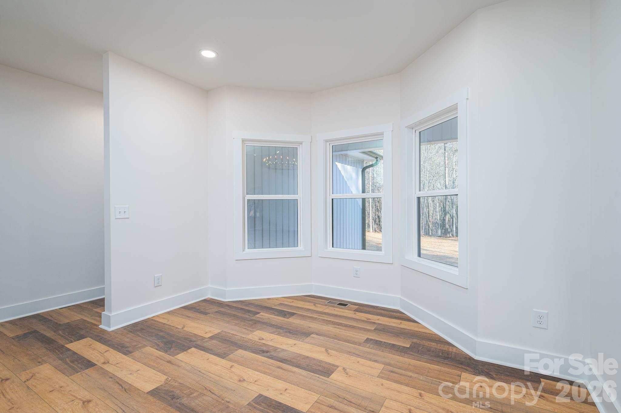 6335 Forney Hill Road Denver, NC 28037 - Photo 33 of 46 a view of an empty room with a window