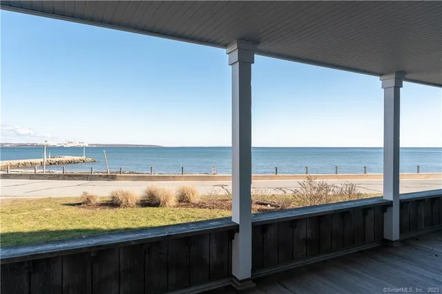 a view of a chairs and table on the deck