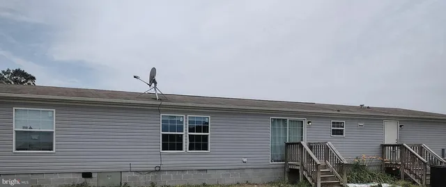 a front view of a house with a balcony