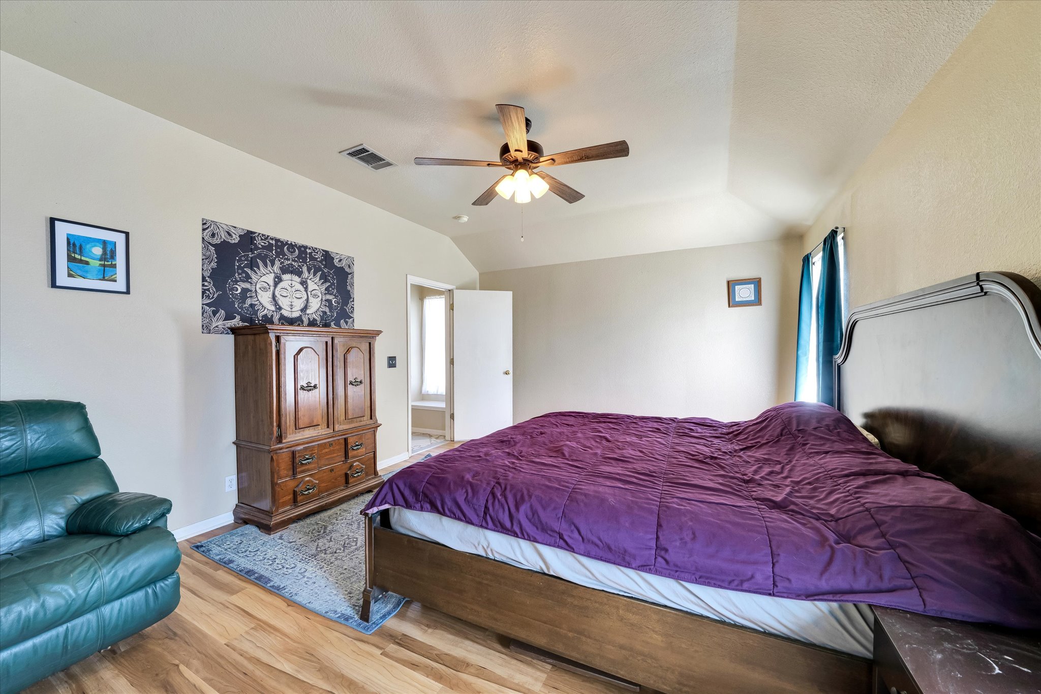 2601 Highcloud Drive Lockhart, TX 78644 - Photo 19 of 30 a bedroom with a bed couch and a window