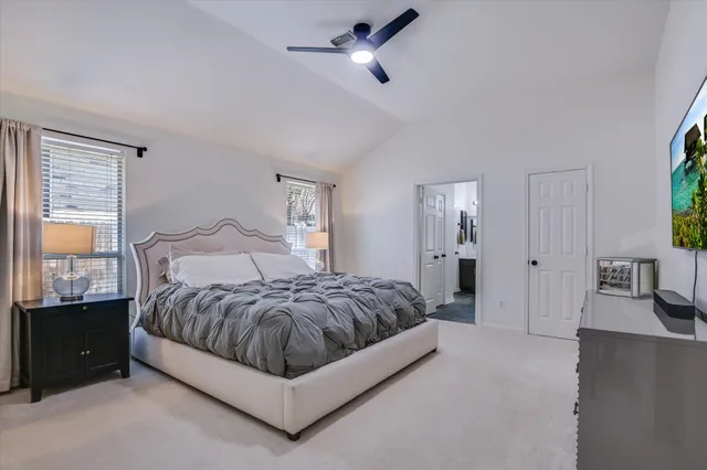 a bathroom with a double vanity sink mirror double and shower